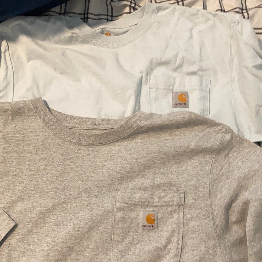 Two carhartt work shirts